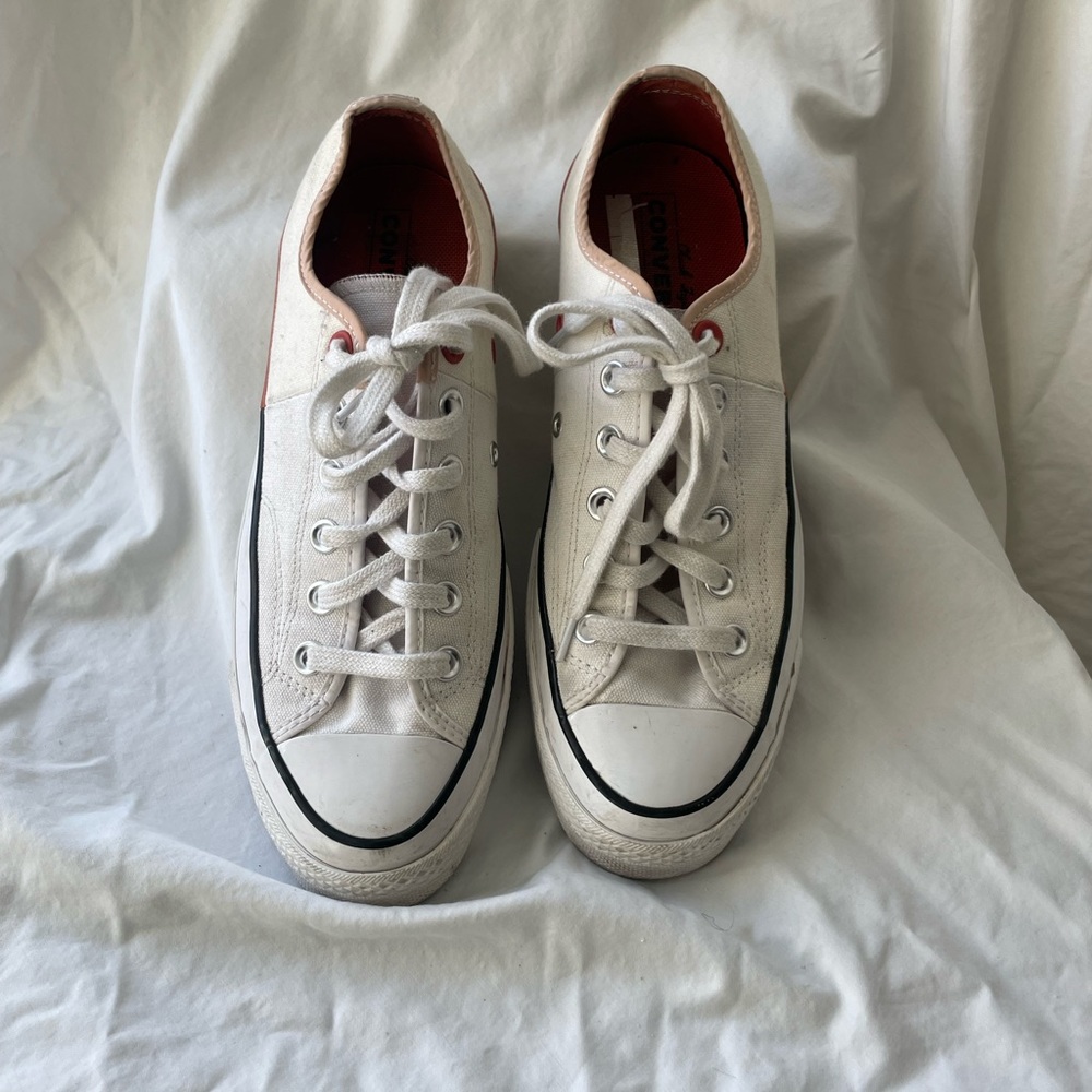 Cream converse low tops